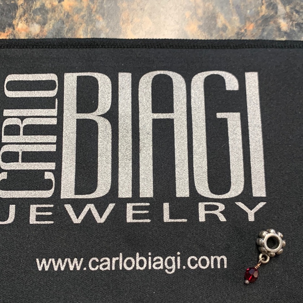 Biagi sterling silver bead w/red stone dangle.  Fits Biagi, Pandora, Camilla